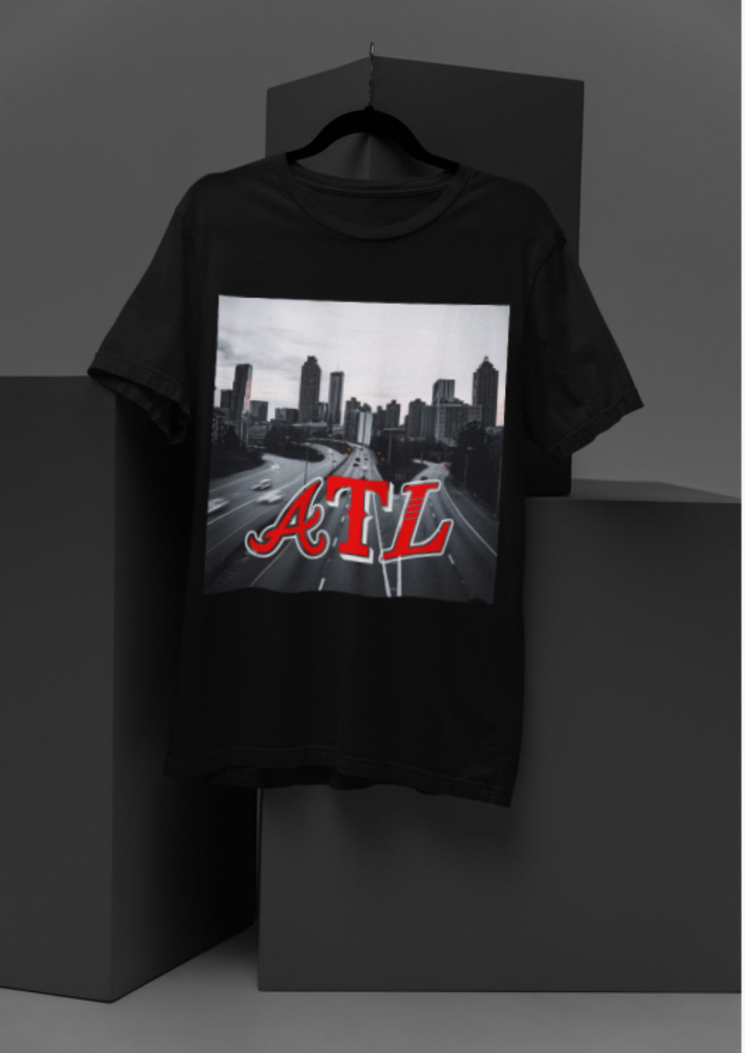 the   A T L   Tee