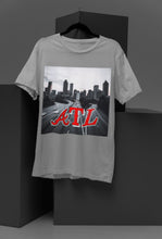 the   A T L   Tee