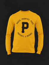 That's  "P" Long Sleeve Tee