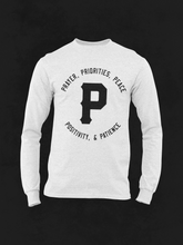 That's  "P" Long Sleeve Tee